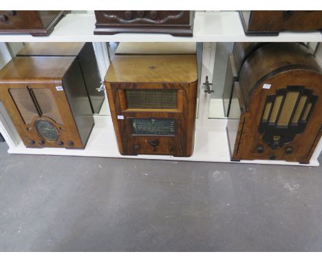Three 1930's walnut Valve Radios - Ferguson 502AC, Philips 638A and Marconi 858 - Tallest 57cm 
Condition report: This item i