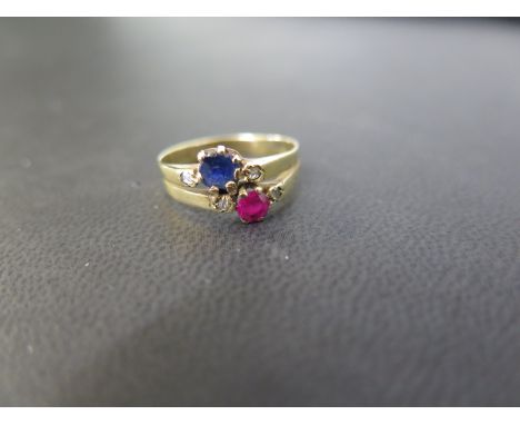 A sapphire, ruby and diamond dress ring - Tests as higher carat gold - Ring size K - Weight approx 2.6gms
Condition Report: G