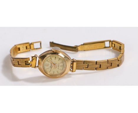 Accurist 9 carat gold ladies wristwatch, the signed cream dial with Arabic and baton markers, manual wound, the case 15mm wid