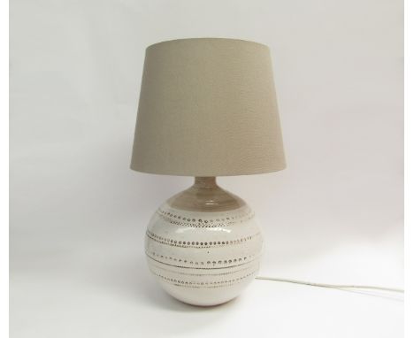 A Bitossi lamp base in white with impressed motifs (possibly made for Pier UK) with shade. Base  30cm high, overall 53cm high