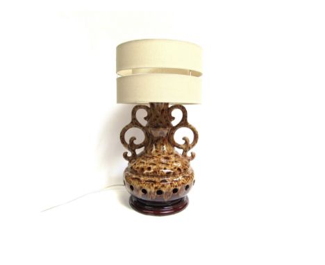 A West German pottery table lamp base with mottled treacle glazes. Base  40cm high 