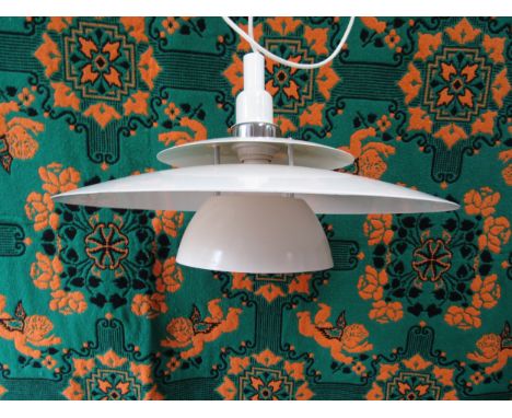 A Danish Poulsen style ceiling light of three tiers in white and chrome. Approx 43cm diameter 
