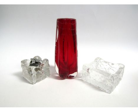 A Whitefriars ruby glass lobed vase with bubble inclusions and encased in clear, 19.5cm, a Whitefriars flint table lighter an