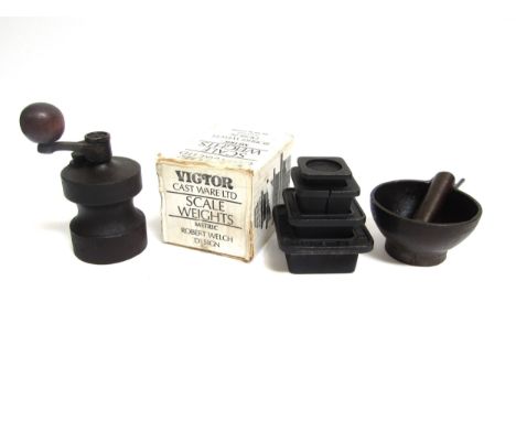 Robert Welch - A Cast iron mortar and pestle, metric scale weights and pepper grinder. 