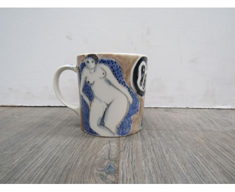 TESSA NEWCOMB (b.1955) A ceramic mug painted with nude female figure. Painted TN 2000 to base. 8.5cm high 