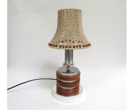 A circa 1970's table lamp in chromed metal and pine discs, crochet shade.  41cm high 