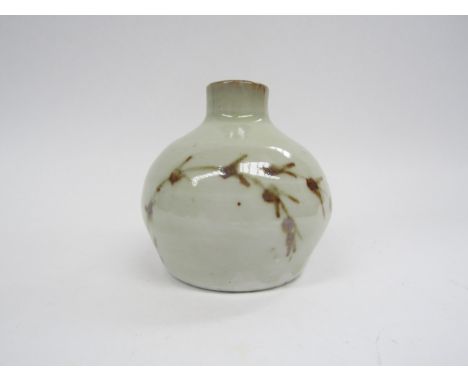 A St Ives leach pottery bud vase, white glaze with painted foliate detail. Impressed pottery seal. 7.5cm high 