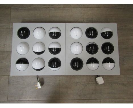 Two wall mounted 'Fifty Fifty' light boxes, designed by Swiss artist Paul Talman, circa 1965, each with nine revolving ball l