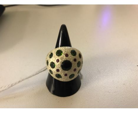 A silver, ruby and diopside ring