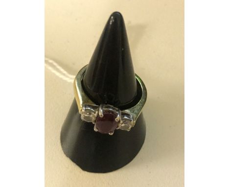 An 18ct diamond and ruby dress ring