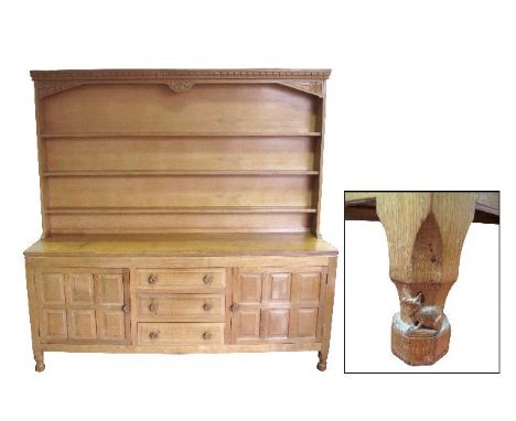 Follower of Robert 'Mouseman' Thompson Light Oak Dresser, with three upper shelves with dentil moulding to top, the base with