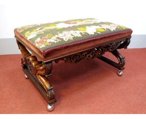 A Mid XIX Century Walnut Duet Stool, the top with rectangular woolwork tapestry top, with applied pierced decoration to front