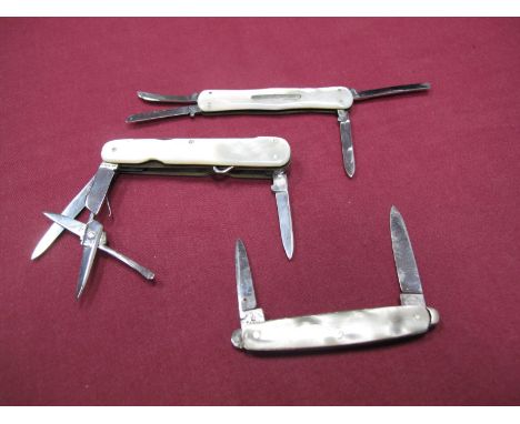 A Multi Blade Folding Knife, stamped "Brumby", with mother of pearl scales, including scissors, button hook, file etc; togeth