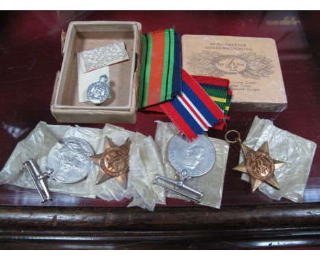 A WWII Medal Quartet, comprising Defence Medal, War Medal, Pacific Star and 1939-45 Star, all with ribbons, in box to "Sander