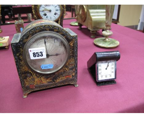 A Jaeger Le Coultre for Fortnum & Mason, London, Travelling Alarm Clock, with eight day movement, in a leather covered foldin