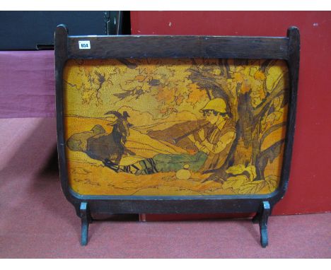 A Late XIX Century Pokerwork Firescreen, worked in the Art Nouveau manner with a scene of a peasant boy, seated beneath a tre