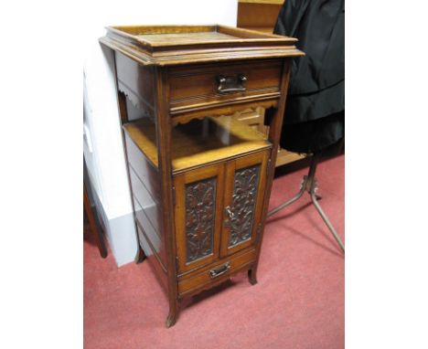 An Early XX Century Oak Smoker's Cabinet, with galleried top, single drawer, over two panelled doors with four internal drawe