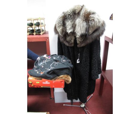 A C.1920's Fox Fur Tippet; a later black curly lamb full length coat; a fur stole, 220cms long; a fringed embroidered piano s