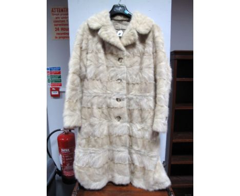 A C.1970's Ladies Cream Mink Coat, full length with pelts stitched horizontally, zips to detachable lower body to form a wais