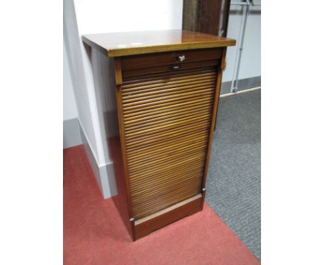 An Early XX Century Mahogany Tambour Fronted Filing Cabinet, with internal shelves, on bracket feet, 91cms high, 48cms wide.