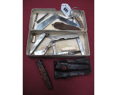 Assorted Folding Knives, with mother of pearls and other scales, folding comb, vesta case with cigar cutter end, etc. 