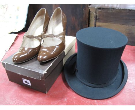 An Early XX Century Christy's of London Folding Theatre Top Hat, approximately 61/4 x 73/4 inches inside measurements; A Pair