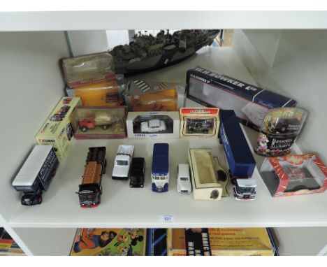 A shelf of modern die-casts including Corgi CC12510 Atkinson Borderer Tautliner, W H Bowker Ltd with limited edition card and