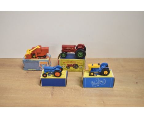 Four Matchbox die-casts, 1969 No 39 Ford Tractor in blue and yellow with yellow hubs, 1961-65 No 72 Fordson Tractor with oran