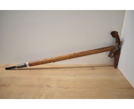 A vintage Stubai Schenbrenner Fuhrerpickel, Ges, Gesch Ice Axe, with leather covers, length 82cm