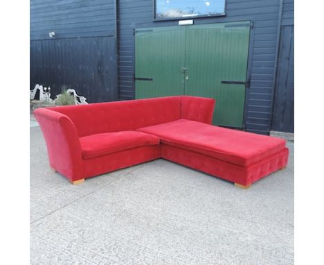 A hand-made red velvet upholstered corner sofa, by Sitting Pretty, the velvet upholstery by The Designer's Guild, 315cm