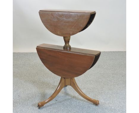A Victorian mahogany two tier drop leaf dumbwaiter, on a tripod base, 66cm high