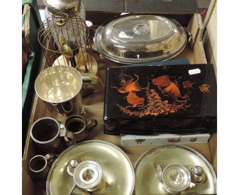 A box of silver plate and metalwares, to include a cocktail shaker and automaton  