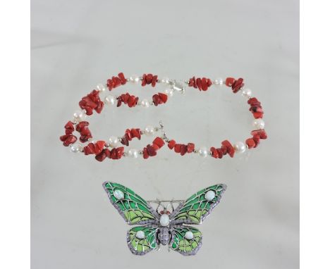 A silver plique a jour butterfly brooch, together with a silver coral and pearl bracelet