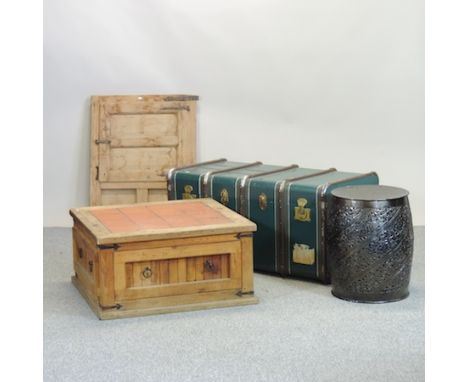 A tile top coffee table, 79cm, together with a trunk, a garden seat and a pine panel