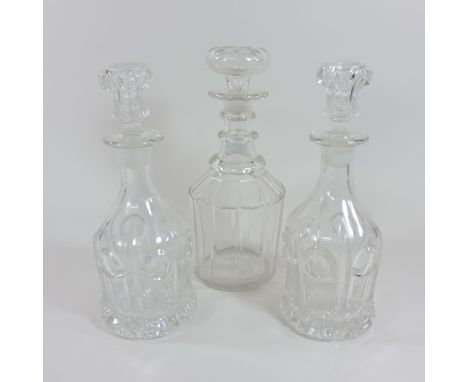 A George III glass decanter, together with a pair of decanters