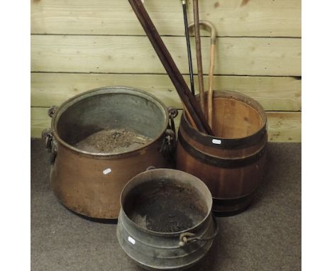 An oak coopered barrel, together with various walking sticks, a walnut cased mantle clock and copper items 