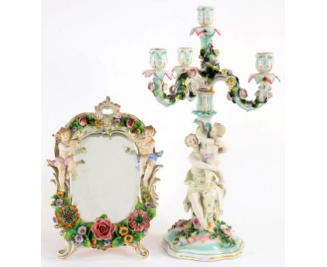 A SITZENDORF FLORAL ENCRUSTED EASEL MIRROR WITH LIGHT WOOD BACK, 31CM H AND A SIMILAR GERMAN PORCELAIN FLORAL ENCRUSTED CANDE
