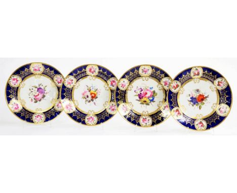 A SET OF FOUR CHAMBERLAIN'S WORCESTER COBALT GROUND DESSERT PLATES, PAINTED WITH A CENTRAL FLOWER SPRAY AND SIX RESERVES OF S