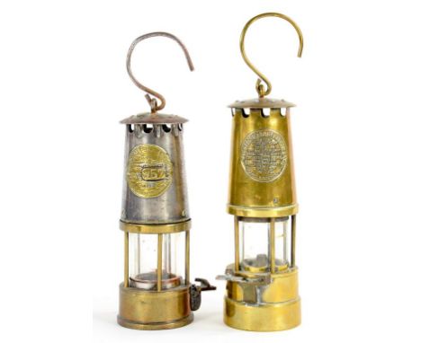 A BRASS AND STEEL MINERS LAMP, BY THE PROTECTOR LAMP AND LIGHTING CO, 25CM H, EARLY 20TH C AND A LATER SIMILAR EXAMPLE OF BRA