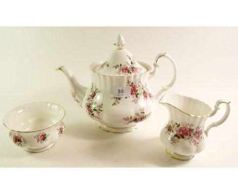 A Royal Albert Lavender Rose tea service comprising teapot, milk, sugar, cake plate, six cups and saucers and six tea plates 