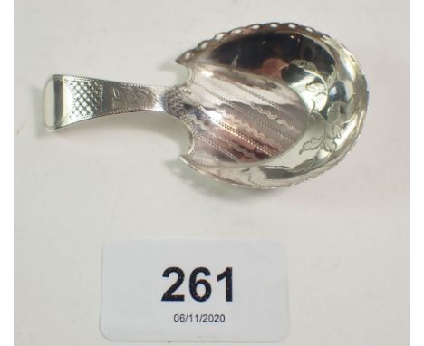 A Georgian silver caddy spoon with engraved decoration, Birmingham 1809 