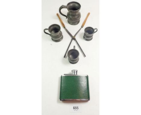 Four pewter measures, a pair of curling tongs by R Timmins and a spirit flask 