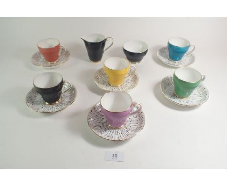 A Royal Grafton harlequin coffee service comprising: six cups and saucers, jug and bowl 