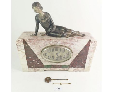 A 1920's Art Deco marble mantel clock set with spelter figure of a period lady lounging with sparrow, 37cm wide. 