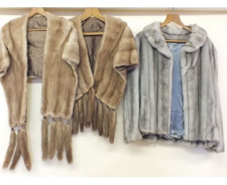 Two fur stoles and an 'Astraka' grey fake fur jacket 