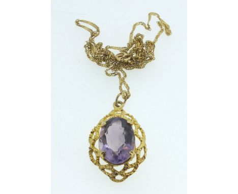 A 9 carat gold pendant set amethyst on 9 carat gold chain 