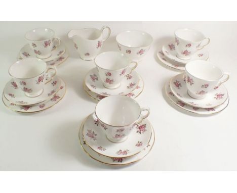 A Queen Anne vintage tea service comprising: six cups and saucers, six tea plates, jug and sugar bowl 