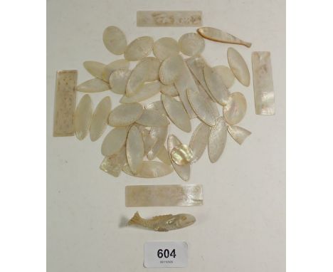 A selection of Chinese engraved mother of pearl gaming markers/counters 