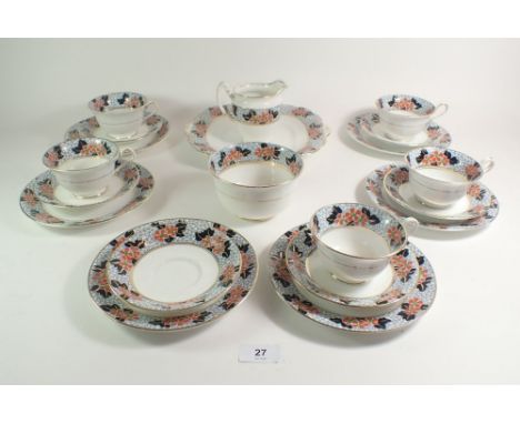 An Edwardian Bridgwood tea service, 'Hawthorn', comprising: five cups and saucers, six tea plates, cake  plate, milk and suga