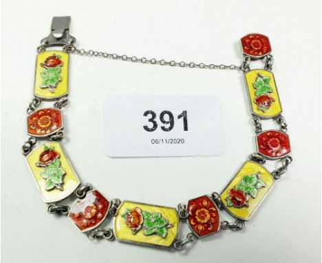 A silver and enamel link bracelet with rose and flower head links, 21 gm 